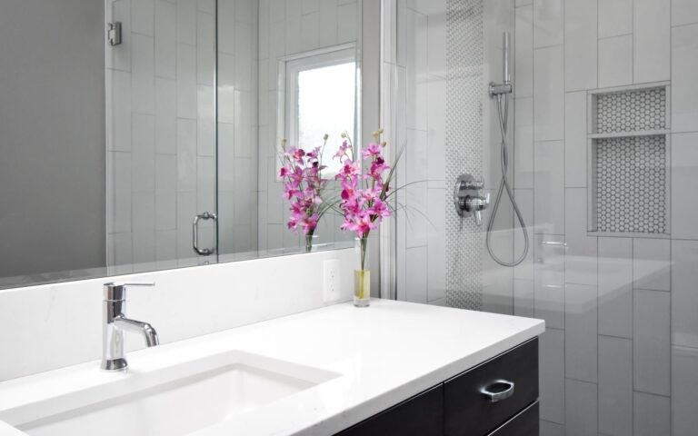Flowers on bathroom vanity white quartz countertop