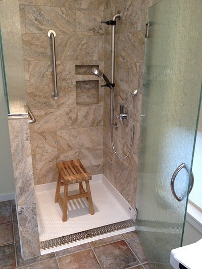 Tile shower with grab bars and shower seat