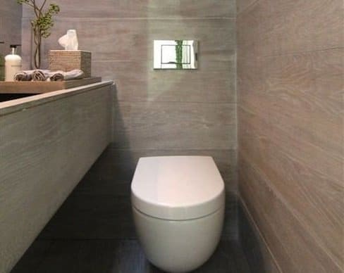 Wall mounted toilet in new bathroom