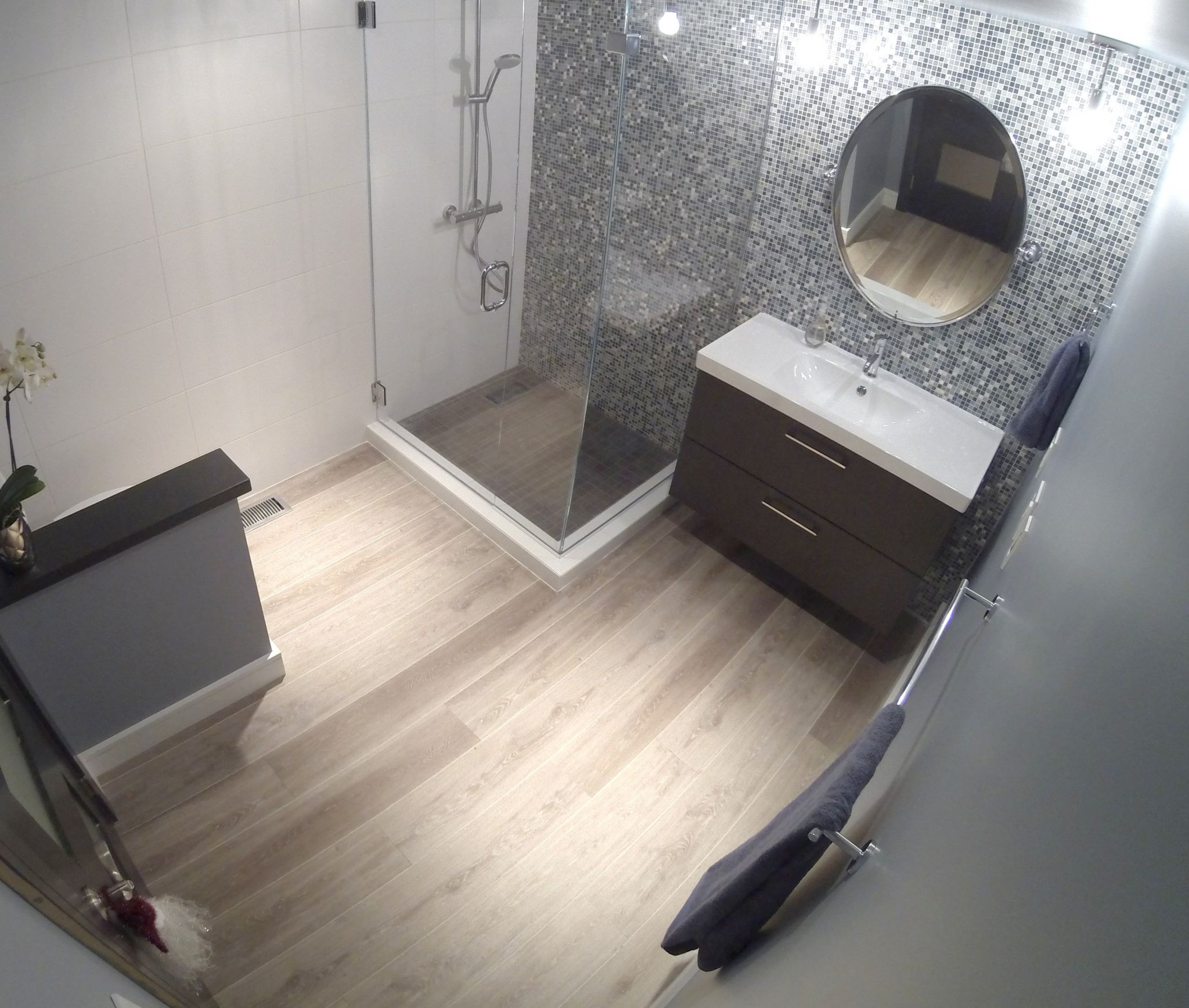 Remodeled bathroom with custom tile